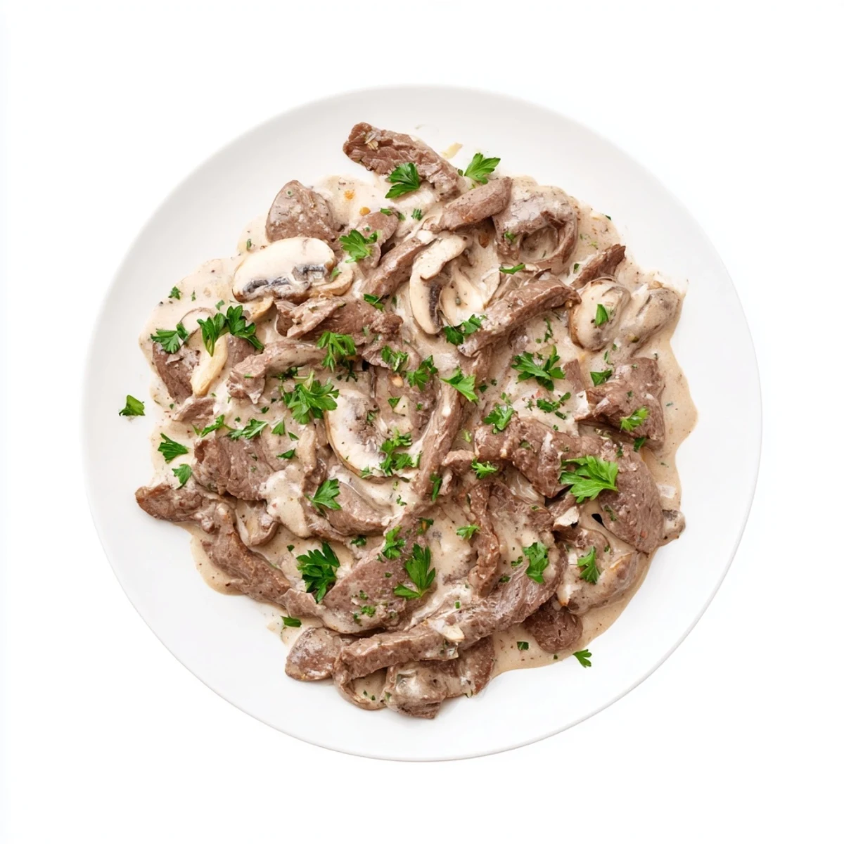 Homemade beef stroganoff featuring seared beef strips in rich sour cream sauce served over white rice