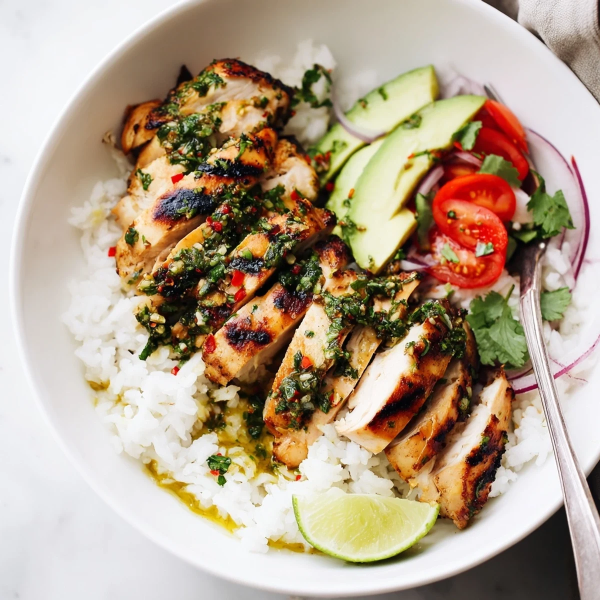 Chimichurri Grilled Chicken Bowl With Garlic Sauce on rice, juicy charred chicken.