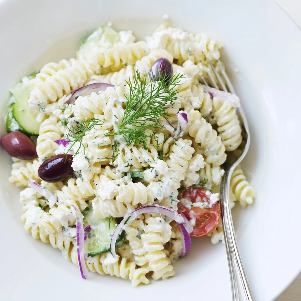 Chilled Tzatziki Pasta Salad Mix with feta, cherry tomatoes, fresh dill